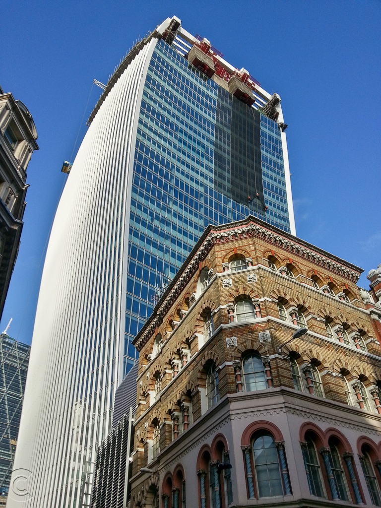 Temporary curtains being attached to south elevation of 20 Fenchurch Street to combat the solar beam problem